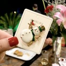 GOLDFINGER WHITE SNOWMAN BROOCH thumbnail